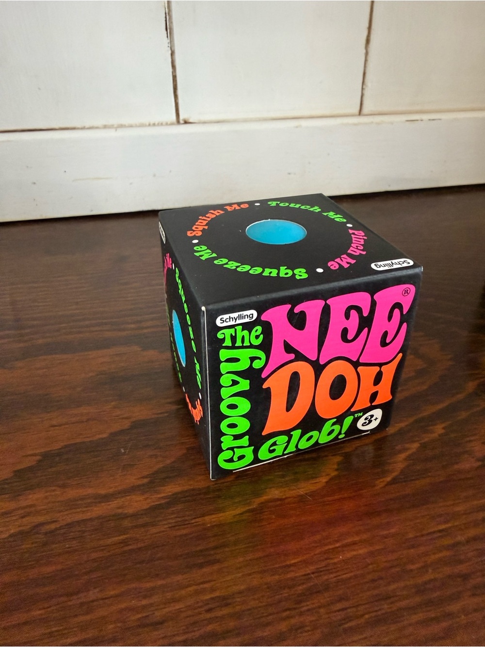 NeeDoh Groovy Glob Stress Ball - Black with Neon Pink, Orange & Green Accents
